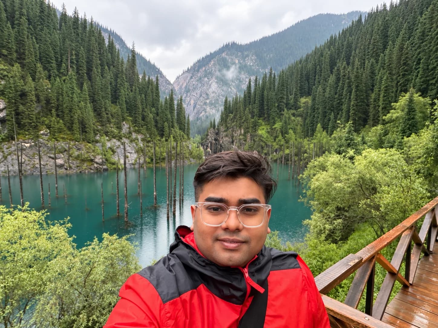 Ashwin travelling beside a mountain lake